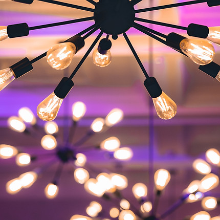 beautiful light fixtures displayed at Revel32 that are modern and add an ambiance to the setting
